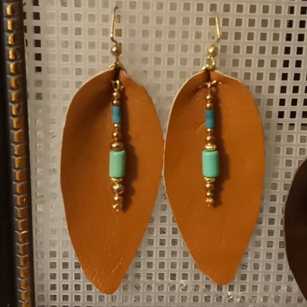 Leather teardrop earrings.